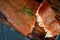 A half-torn piece of smoked salmon fillet on a wooden Board