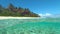 HALF UNDERWATER: Turquoise water washes the beautiful exotic white sand beach.