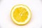 Half yellow very juicy lemon slice isolated