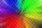 Halftone Dots in Rainbow Colors Background