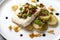 Halibut with baby potatoes, broad beans and chorizo