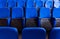 Hall with rows of blue seats