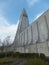 HallgrÃ­mskirkja church in ReykjavÃ­k against blue sky