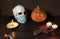 Halloween 2020 and coronavirus. Happy halloween Carving. Halloween pumpkin head lantern on wooden background, with burning candles