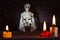 Halloween abstract background with skeleton and candles on cemetery