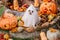 halloween animals. dog ghost among scary rye pumpkins. festive decorations.