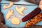 Halloween and autumn background with cookies, burlap and corncob