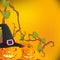 Halloween autumn background with three pumpkins,