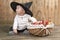 Halloween baby with basket of apples