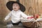 Halloween baby with basket of apples