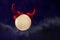 Halloween background moon devil horns on dark