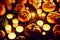 Halloween background. Pumpkins, candles, gloomy atmosphere. Neural network generated art. Digitally generated image. Not