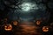 Halloween background with pumpkins, full moon and bats.