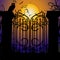 Halloween background with a scary cemetery door