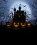 Halloween background with scary pumpkins and Dracula castle