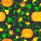 Halloween background. Seamless pattern. Pumpkin with twisted stems, leaves and flowers on a black background