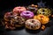 Halloween background. Set of donuts on a black plate