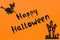 Halloween background. Text Happy Halloween Black paper Witch and haunted house castle and black frame on orange background