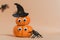 Halloween banner, cute pumpkins with googly eyes. Witch hat. Set orange pumpkin monsters and crawling spiders