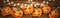 Halloween banner or website header design with creepy pumpkin faces and glowing lights on wooden background.