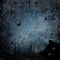 Halloween blue navy gray grunge background with black cat with green eyes, silhouettes of spiders, spider webs