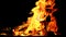 halloween bonfire. magical colorful flame. fiery wallpaper. Variegated flames and colorful sparks close-up. Fire and