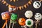 Halloween cake pops and marshmallow with funny monster faces