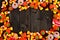 Halloween candy frame over dark wood