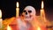 Halloween candy with skull animationFootage of Halloween day with candle background