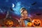 Halloween celebration. Charming little girl in a princess costume on the background of the evening moon sky