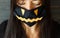 Halloween celebration with safety measures due coronavirus pandemic. Female in evil face mask