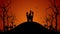 Halloween cemetery landscape silhouette. Spooky halloween night. Haunted hill and castle. Loop animation.