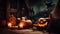 Halloween composition of a burning group of pumpkins with a candle, dark background. AI generated.