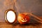 Halloween concept. Cute pumpkins next to blank photo frame