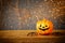 Halloween concept. Cute pumpkins on wooden table