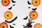 Halloween concept, Scary smile pumpkin with centipede and spider with silhouette flying black bat