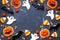 Halloween cookie frame on a dark stone background