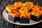 Halloween Cream Cheese Brownies cake delicious dessert for a festive treat closeup on a plate. horizontal