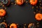 Halloween creepy decor concept. Top view photo of pumpkins jelly candies centipedes and spiders on isolated black background with