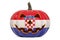 Halloween in Croatia concept. Evil carved pumpkin with Croatian flag, 3D rendering