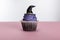 Halloween cupcake with purple cream and