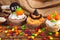 Halloween cupcakes with colored decorations
