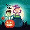 Halloween dark scene with kids disguised and pumpkon
