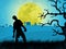 The Halloween day.Zombies walk from the graveyard under the moonlight on Halloween night
