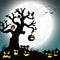 Halloween dead tree and pumpkins in front of an full moon