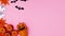 Halloween decoration appear on right side of pink theme. Stop motionHalloween decoration appear on left side of pink theme. Stop m