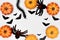 Halloween decorations concept, Scary smile pumpkin with centipede and spider with flying black bat