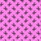 Halloween decorations - seamless pattern with black plastic spiders on glowing pink background