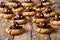 Halloween dessert: shortbread cookies with chocolate spiders close-up. horizontal background