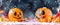 Halloween festive composition with smiling pumpkins guards, fire and smoke on dark background, selective focus